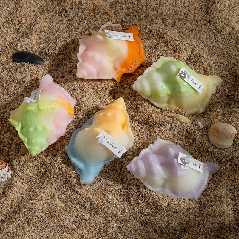 RenFan conch shell aromatherapy candle gift with a natural conch shell and lit wick, perfect for relaxing aromatherapy sessions.