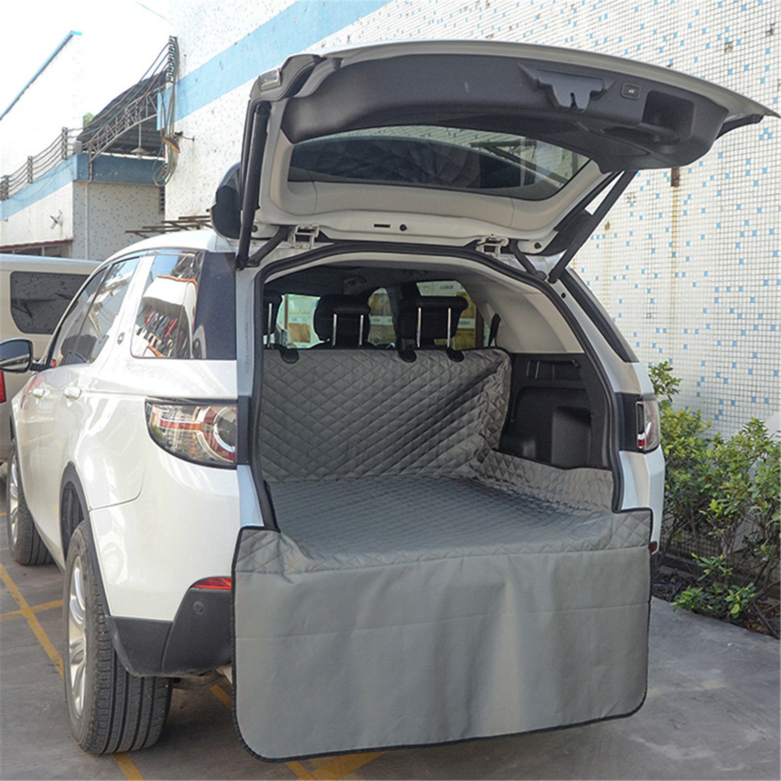 Waterproof pet car trunk mats by RenFan, cushioned and durable for protecting car interiors from pet hair and mess.