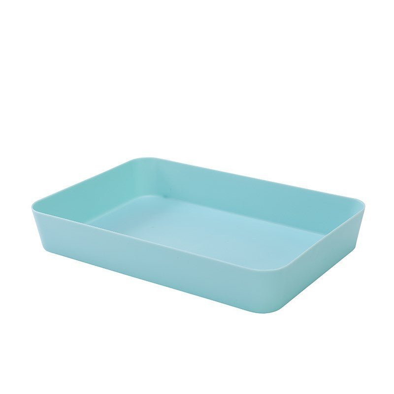 Multi-compartment drawer organizer for cosmetics and small household items.