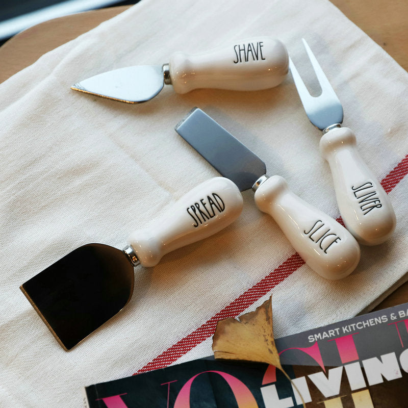 Set of four RenFan butter knives for cheese, bread, and jam, with stainless steel blades and ergonomic handles.