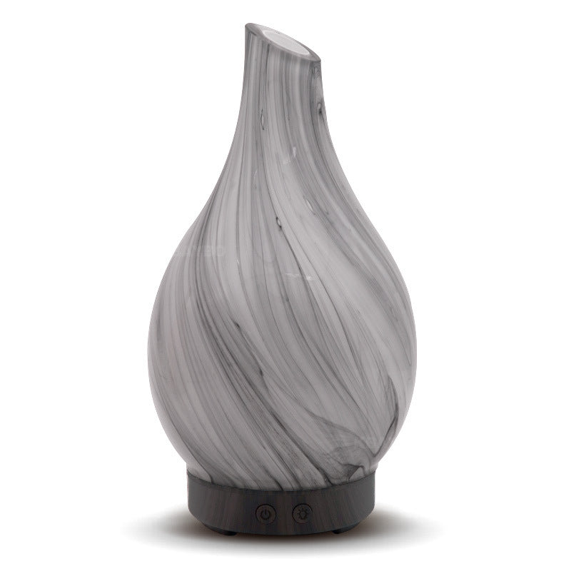 Colorful RenFan aromatherapy humidifier with mist output and adjustable settings, designed for relaxing aroma therapy.