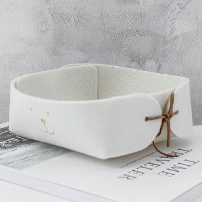 RenFan mini storage basket for jewelry and sundries, small desktop home organizer with a compact design.