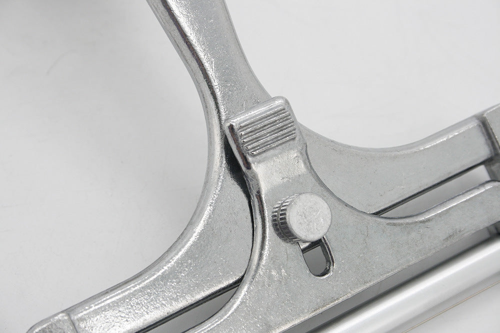 Aiqi aluminum butter and cheese scraper in a kitchen setting, designed for spreading and slicing dairy products efficiently.