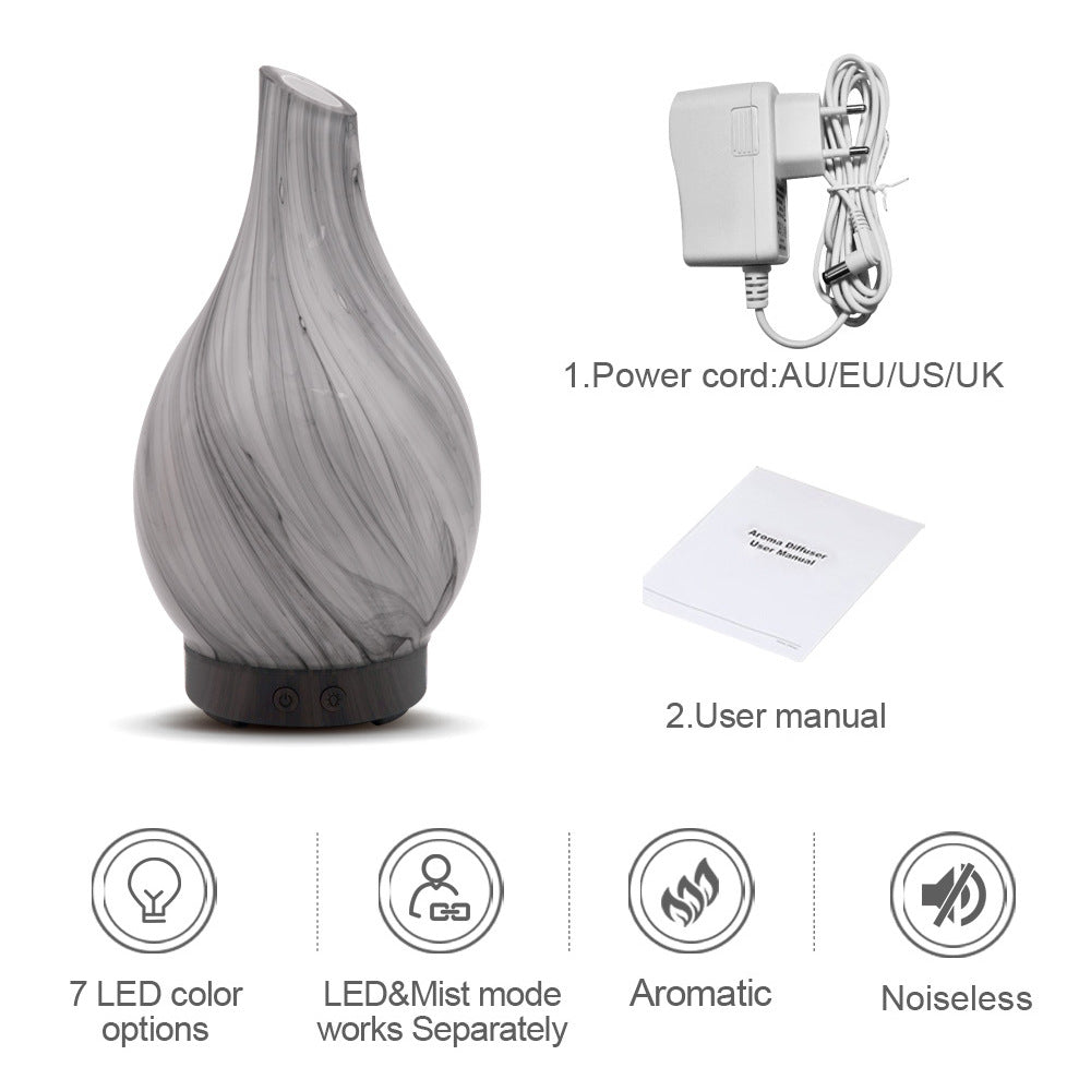 Colorful aromatherapy humidifier machine by RenFan, displaying vibrant design and mist output for air freshening and relaxation.