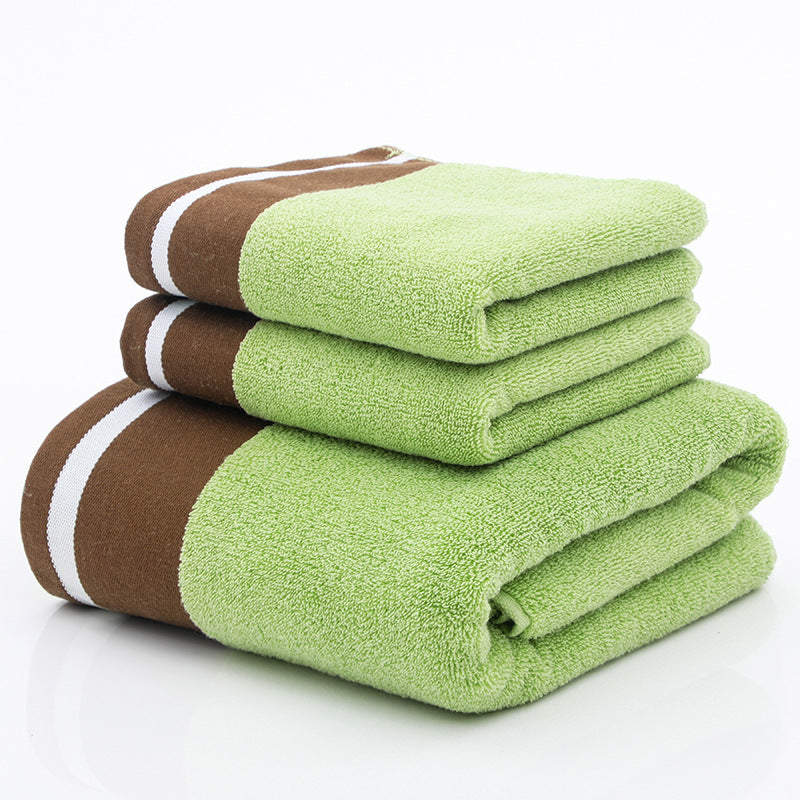 White RenFan cotton bath towel draped over a towel rack, soft and plush for bathroom use.