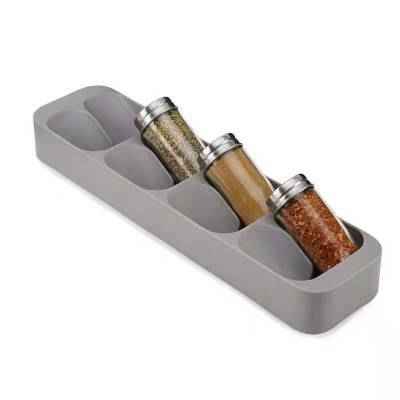 Spice rack organizer for kitchen bottles and seasoning jars.
