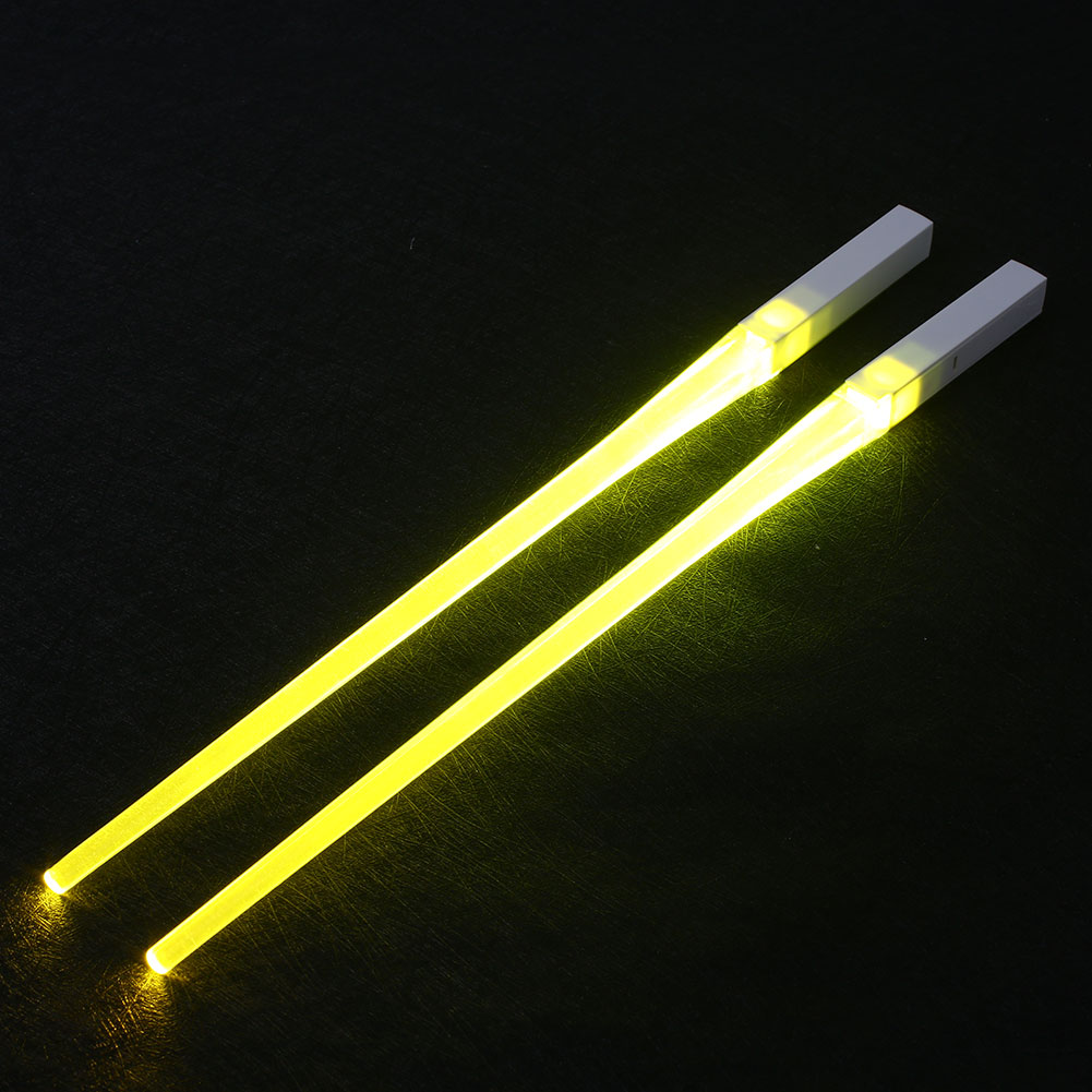 Glowing chopsticks from RenFan kitchen supplies, featuring a sleek design with illuminated tips for modern dining.