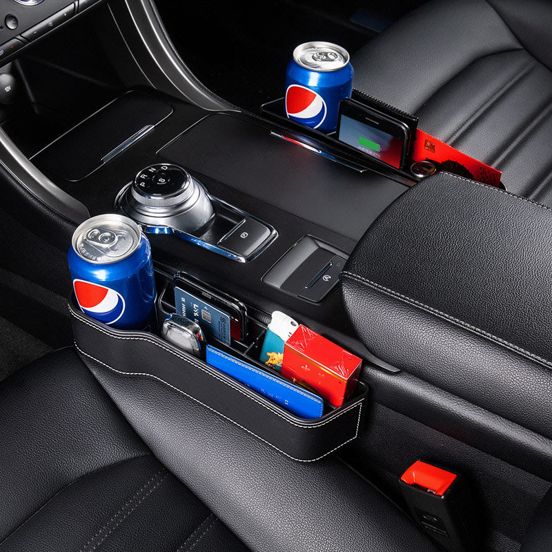 Aiqi car seat gap storage box fitting between car seats to hold small items and prevent them from falling into the gap.