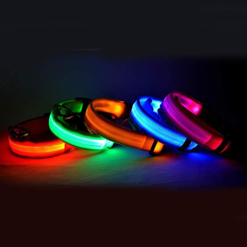 Adjustable nylon LED pet collar with glowing safety light for dogs and cats, designed for nighttime visibility and security.