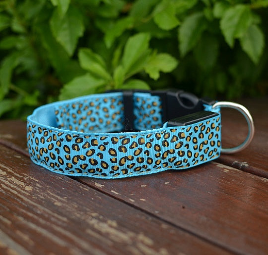 Adjustable LED dog collar by RenFan featuring nylon material and leopard print for pet safety and visibility.