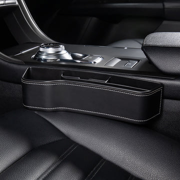 Aiqi car seat gap storage box fitting between car seats to hold small items and prevent them from falling into the gap.