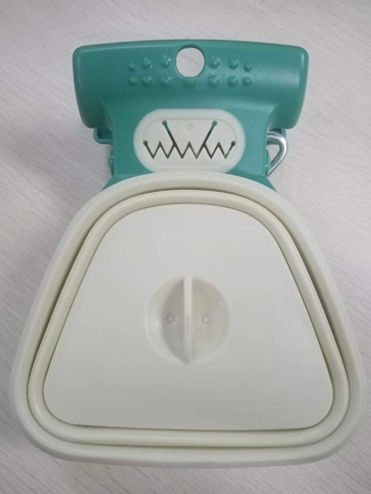 RenFan pet dog poop bag dispenser with foldable poop scoop, portable travel design for convenient pet waste cleanup.