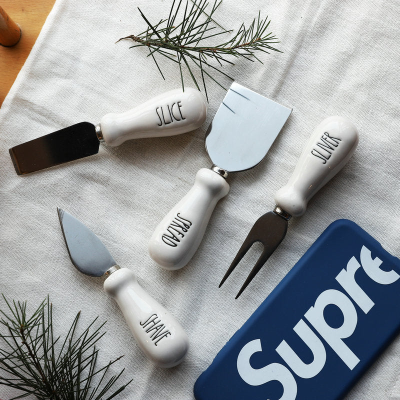 Set of four RenFan butter knives with smooth handles, designed for butter, cheese, bread, jam, and dessert spreading.