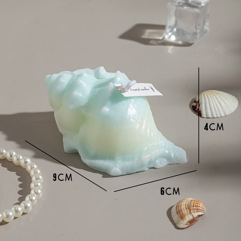 RenFan conch shell aromatherapy candle gift with a natural conch shell design and soothing香薰 for relaxation and ambiance.