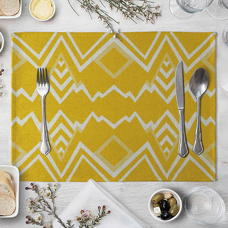 Aiqi geometric pattern dining table placemat made of kitchen supplies, featuring modern design and vibrant colors for table setting.