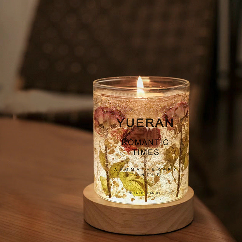 Aiqi aromatherapy candle with real flower jelly and essential oil ornaments, showcasing delicate floral designs and calming colors.