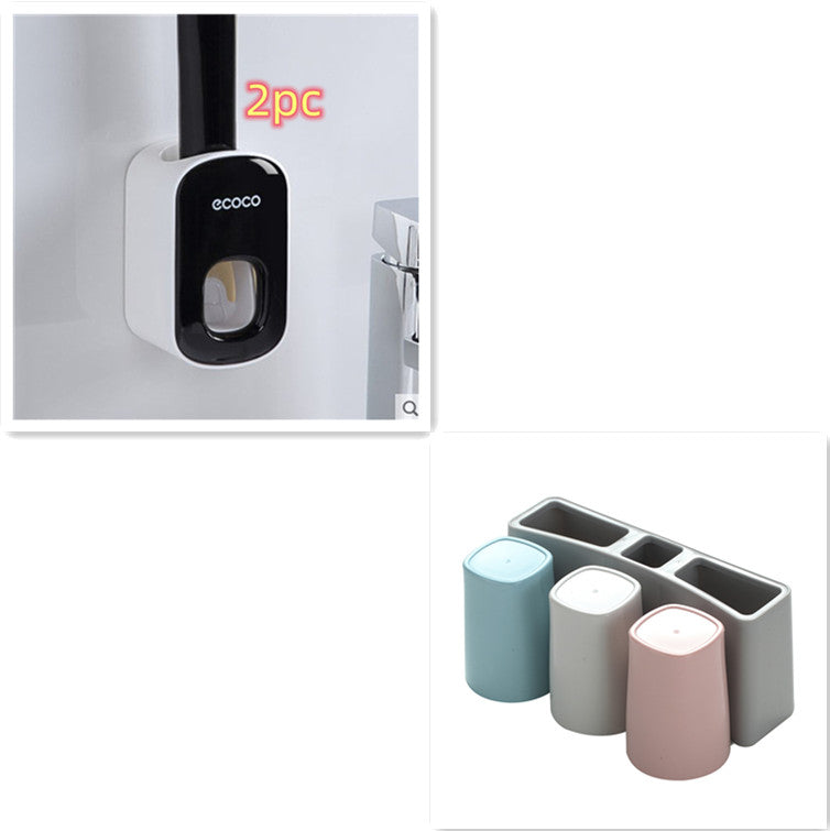 Wall-mounted automatic toothpaste holder from RenFan bathroom accessories set, featuring a sleek dispenser and storage for bathroom use.