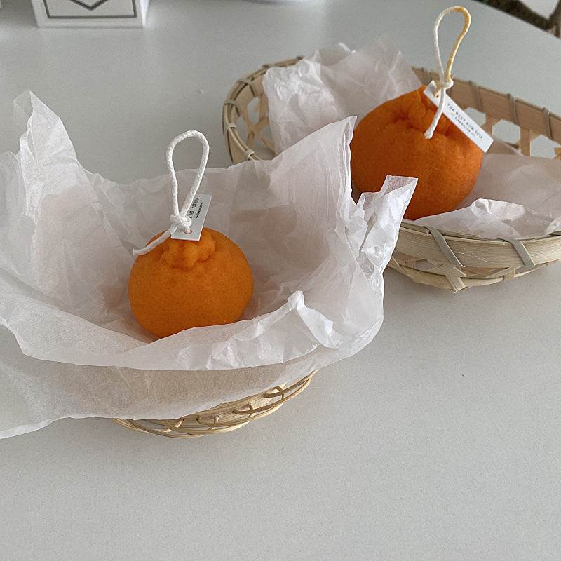 RenFan fruit-shaped aromatherapy candle ornament, simple and decorative 香薰 candle for home relaxation and ambiance.