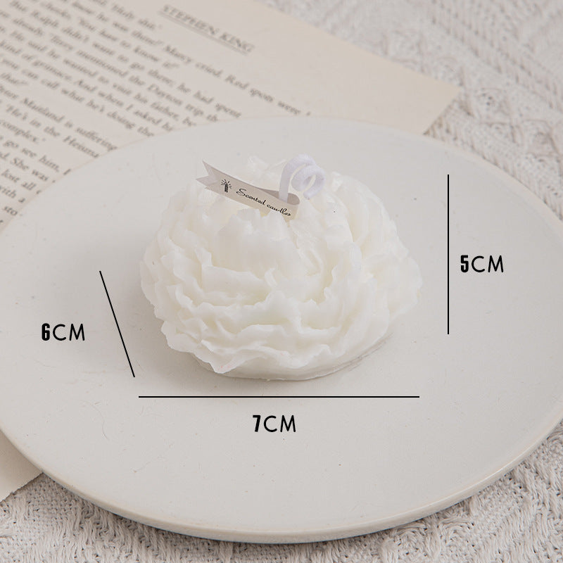 Aromatherapy candle with peony flower design by Aiqi, handcrafted with a decorative peony motif on the candle surface.