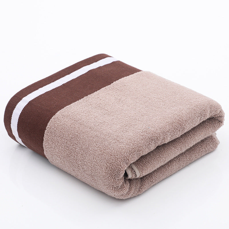 RenFan cotton bath towel hanging in a bathroom, soft and plush, ideal for drying after a shower or bath.