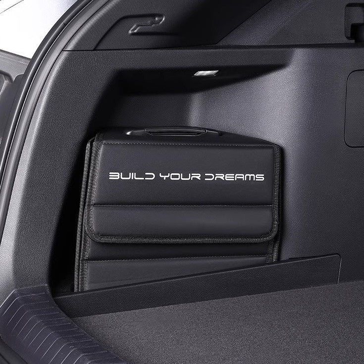 Aiqi leather car multifunction storage box with compartments for organized automobile storage, placed on car seat.