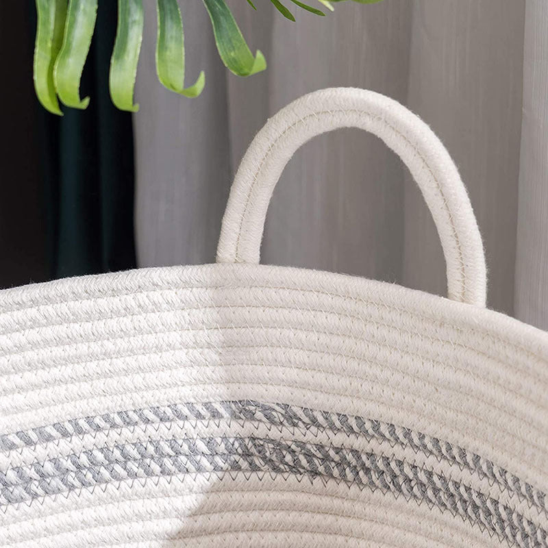 Cotton string knitted storage basket by RenFan, home use, soft woven design, ideal for organizing household items.