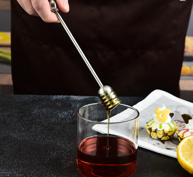 Stainless steel honey spoon from RenFan with long handle, ideal for honey jars and dessert stirring in kitchen supplies.