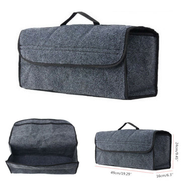 Felt car storage organizer with handle placed in a vehicle for tidy trunk and seat storage.