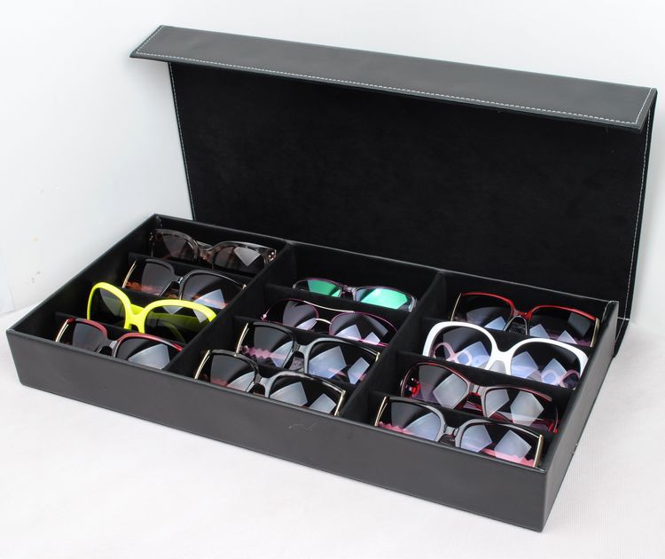 Black glasses storage box with grid compartments, made of PU leather, ideal for organizing sunglasses and eyewear.