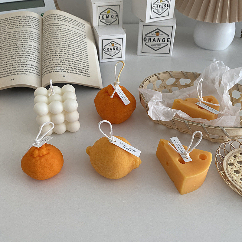 RenFan fruit-shaped aromatherapy candle ornament, simple home decor with a charming fruit design for relaxing ambiance