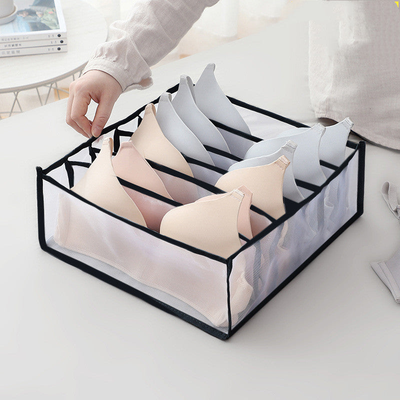 Aiqi foldable mesh storage box for home organization, lightweight and breathable fabric with multiple compartments.