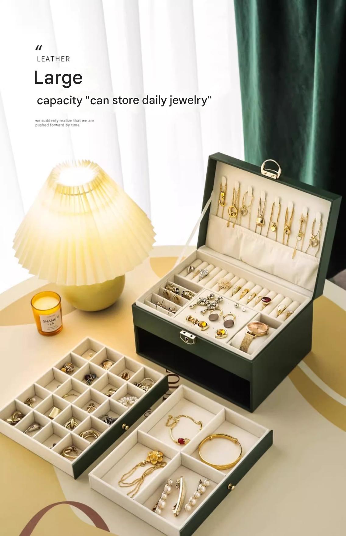Large PETART leather jewelry box with three-tier drawers, gold accents, storing necklaces, earrings, and bracelets in a home accessories organizer.
