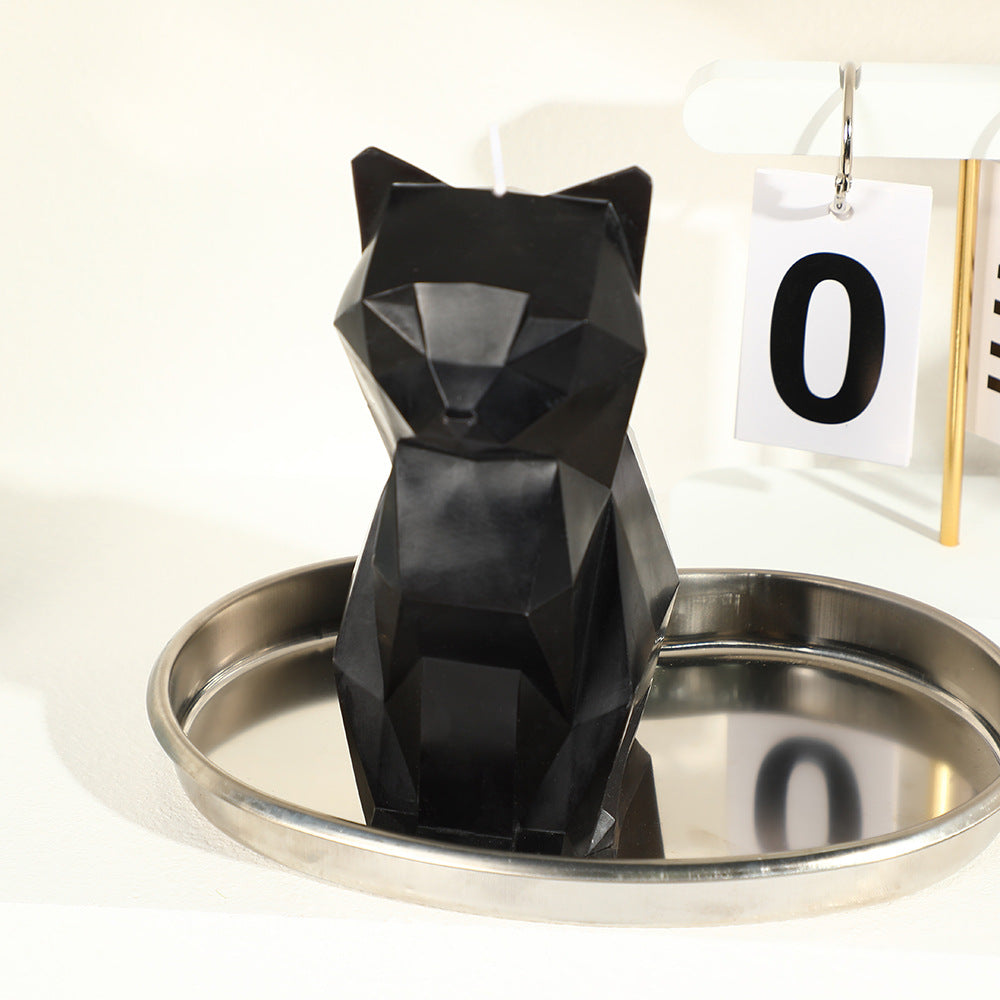 Egyptian black cat aromatherapy candle by RenFan, creatively shaped as a mysterious black cat for home decor and relaxation.