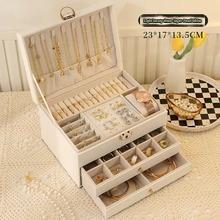 Large leather jewelry box with three-tier drawers for necklaces, earrings, and bracelets, ideal for home jewelry storage by PETART.